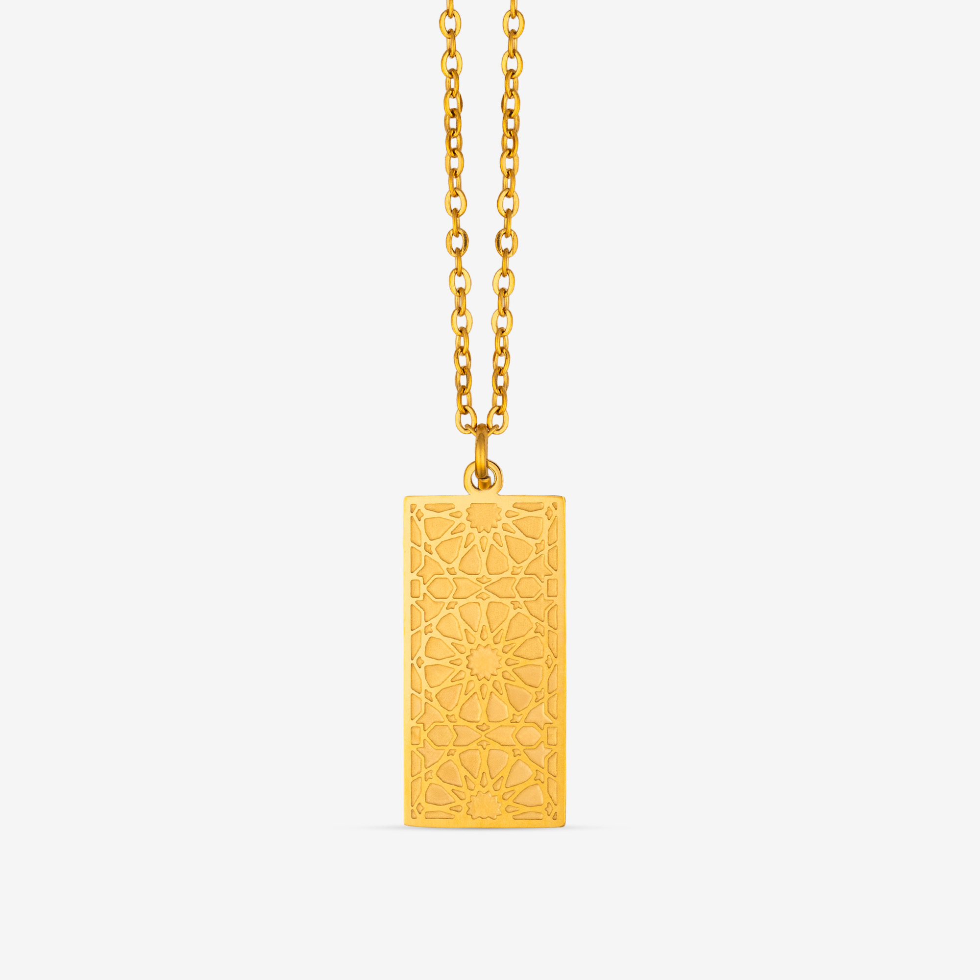 Colgante Placa Geometrías Dorado con lacería nazarí grabada sobre placa rectangular